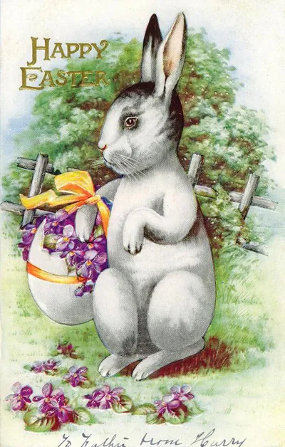 Happy Easter postcard with rabbit and violets