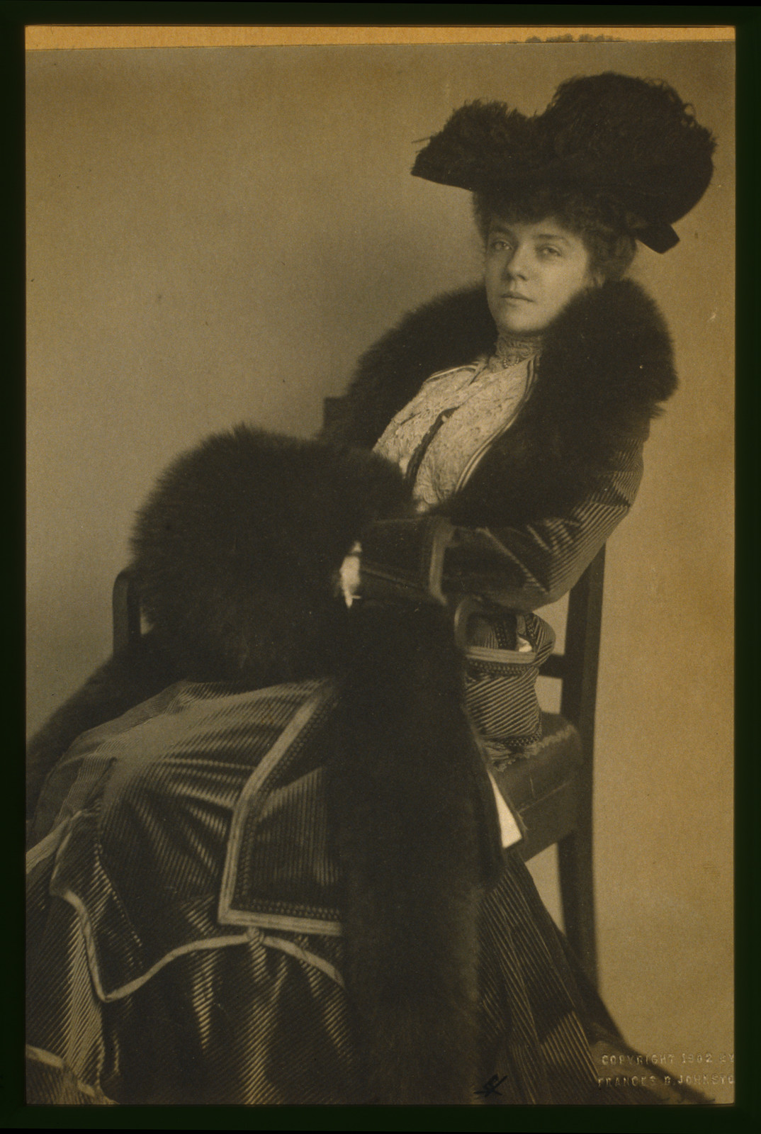 [Alice Roosevelt Longworth, full-length portrait, wearing hat and fur with muff, seated, facing slightly left], c1902 Mar. 24. — historic image