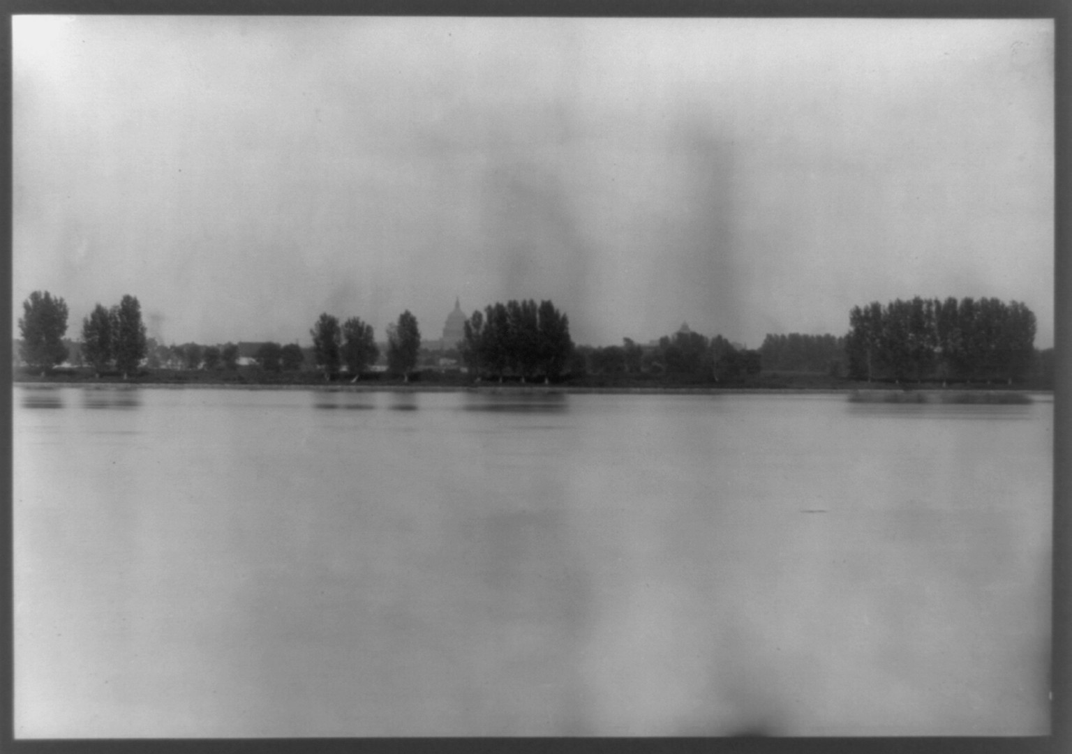 [Potomac River in foreground and dome of the U.S. Capitol in background, Washington, D.C.], [between 1900 and 1920] — historic photograph