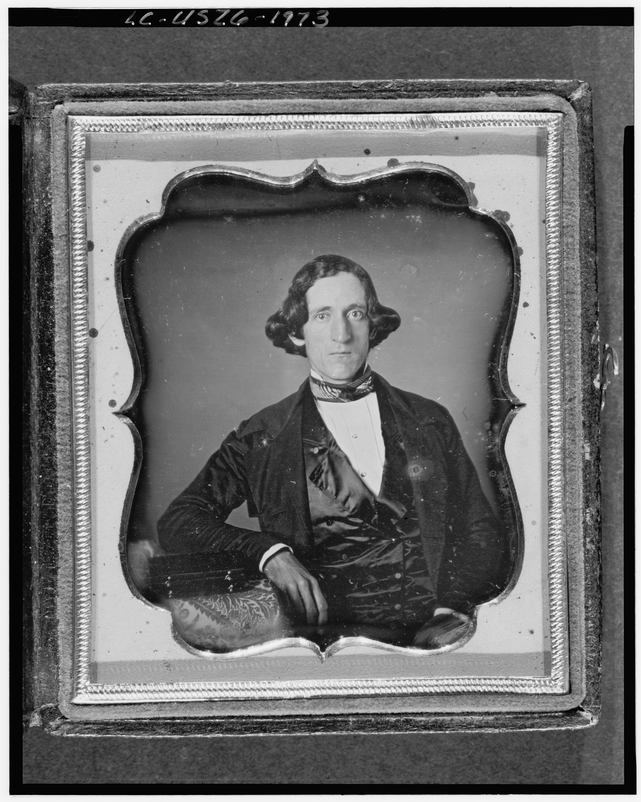 Unidentified man, seated daguerreotype portrait in ornate case, 1850 — historic photograph