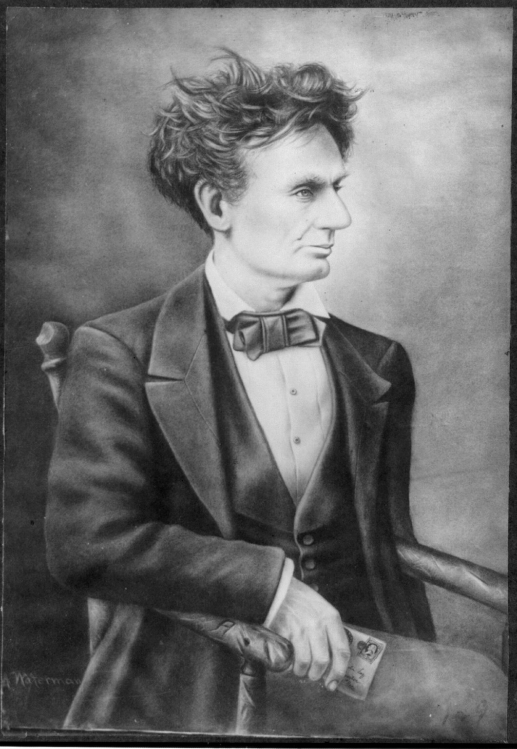 Abraham Lincoln, Three Quarters Length, Seated, Facing Right — historic photograph