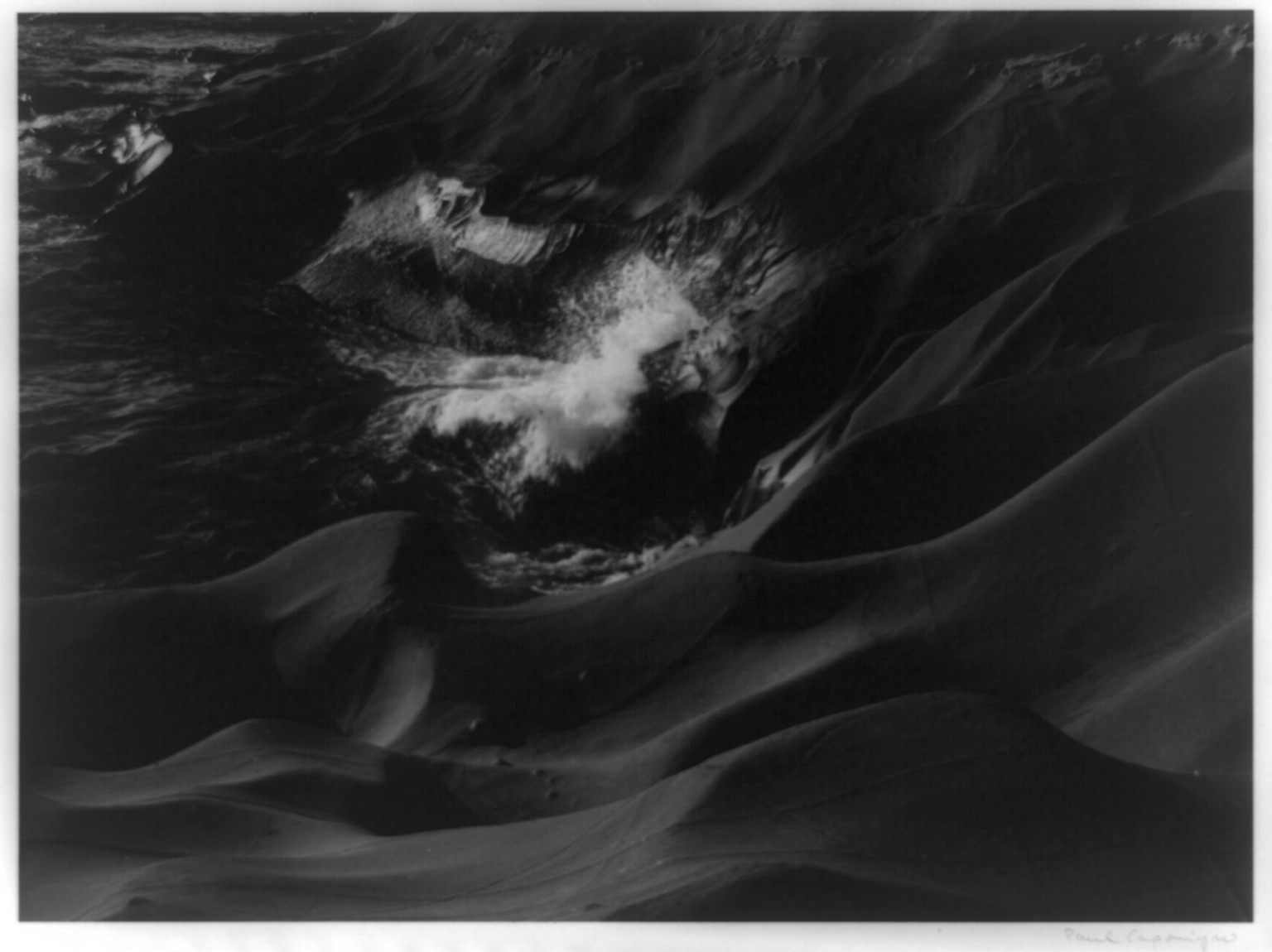 Sandstone and surf, Cape Kiwanda, Oregon / Paul Caponigro., [1961, from a photograph taken in 1959] — historic photograph