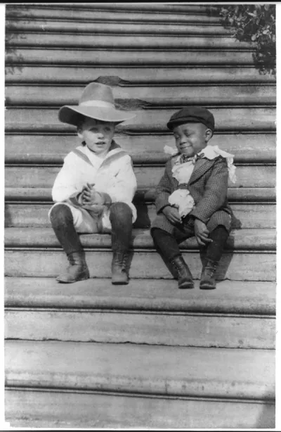 [Quentin Roosevelt and Roswell Newcomb Pinckney seated on steps]