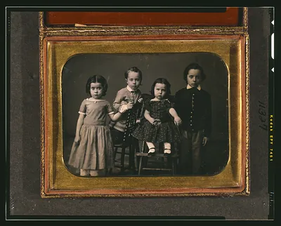 [Lizzie, John, Annie, and Mitchell McAllister]