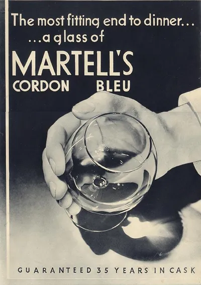 Martell's Cordon Bleu cognac advertisement with hand holding glass