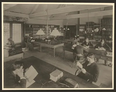 Patrons reading in a library reading room