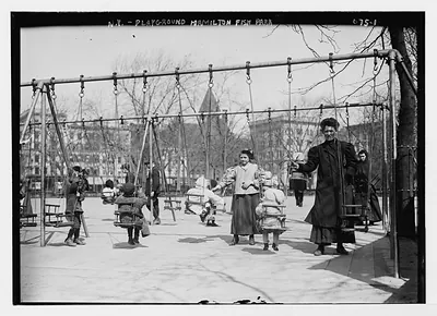 Children in swings, Hamilton Fish Park, New York