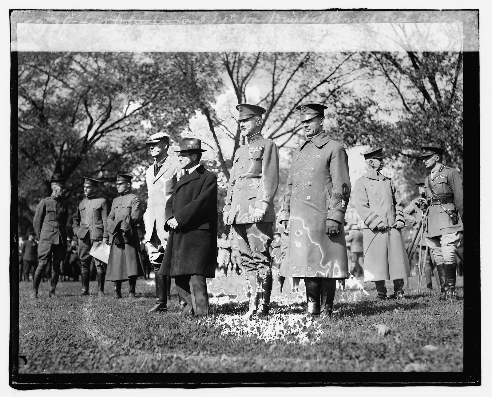 Left to Right: Asst. Secty. War Benedict Crowell, Secty. Baker, General Marsh & Lt. Col., [between 1918 and 1920] — historic photograph