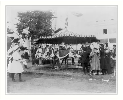 [Minnesota State Fair: children on small merry-go-round]