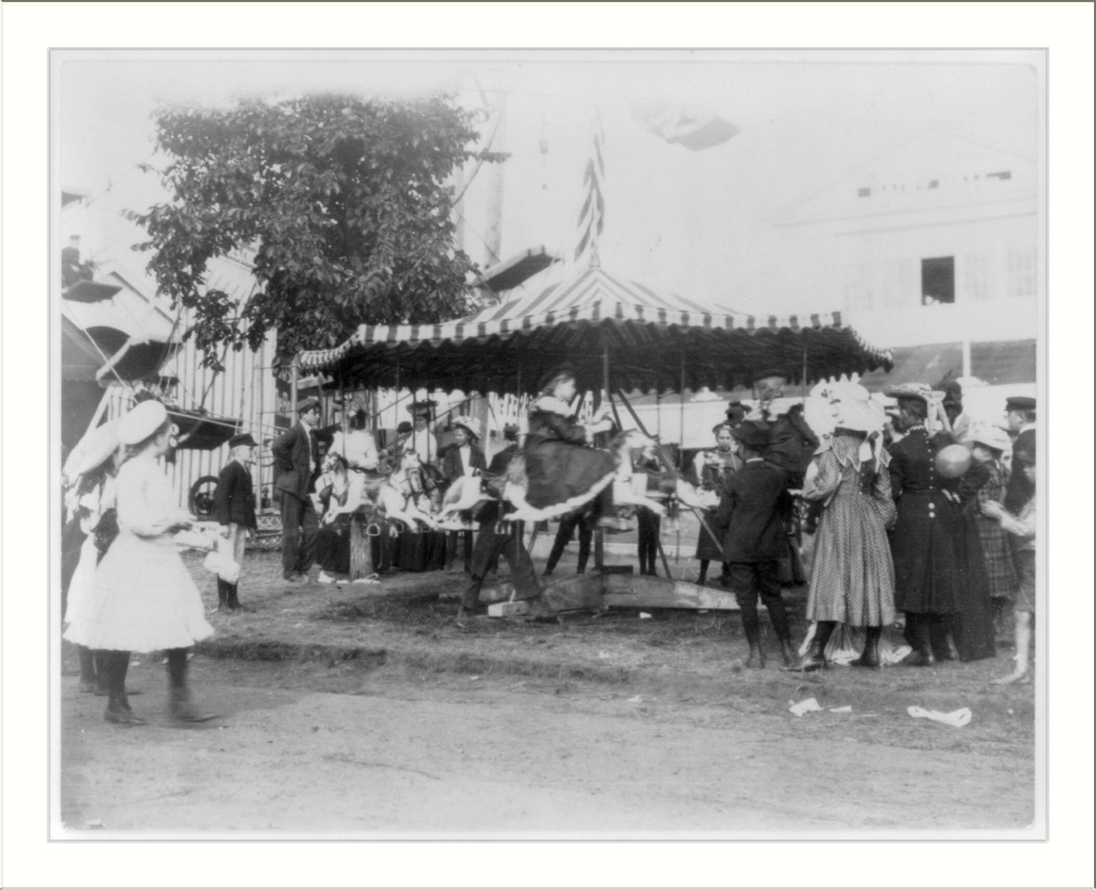 [Minnesota State Fair: children on small merry-go-round], [1900?] — historic photograph