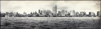 Panoramic photograph of a city skyline across water
