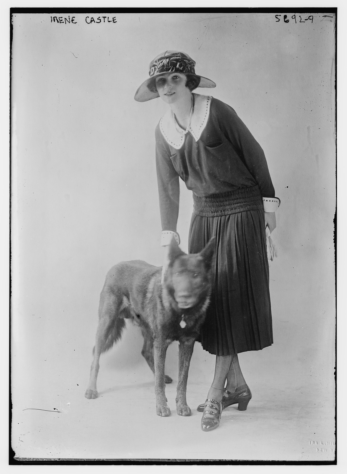Irene Castle with pet dog, n/a — historic photograph