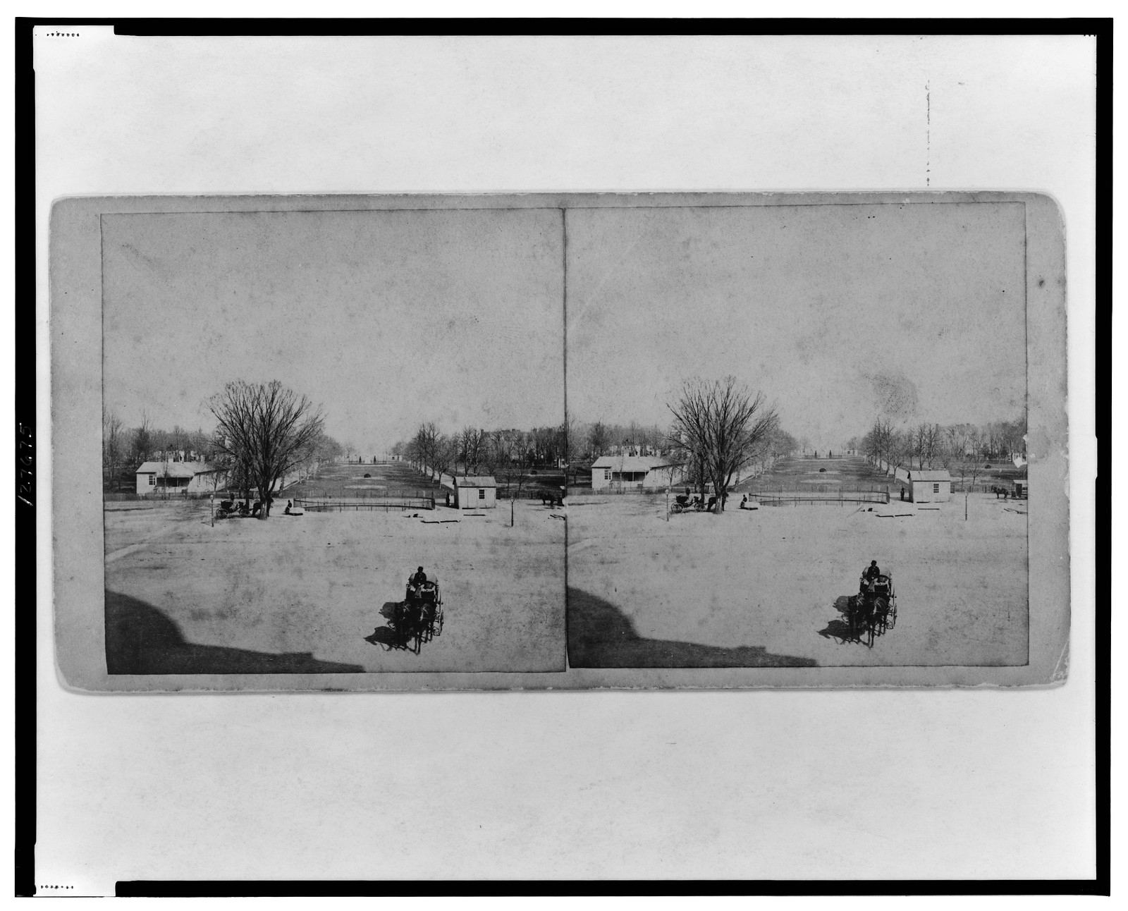 [U.S. Capitol grounds, looking east with horse-drawn carriage in foreground], c1866. — historic photograph