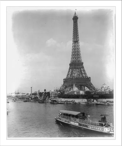 [Eiffel Tower and exposition buildings on the Champ de Mars, as seen from the River Seine, Paris Exposition, 1889]