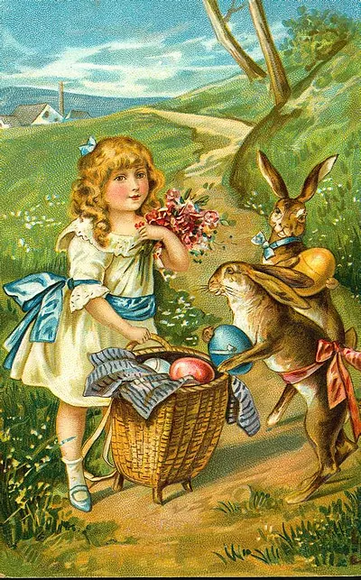 Girl with rabbits and Easter eggs in basket