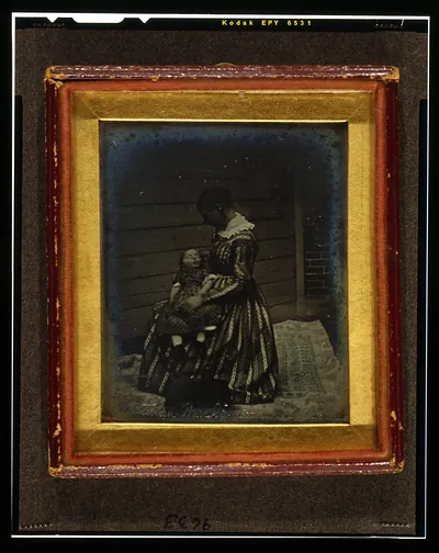 W. Mitchell McAllister in his nurses lap