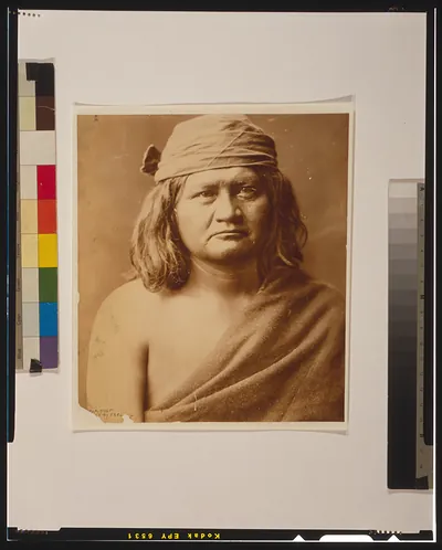 [Native man, head-and-shoulders portrait, facing front]