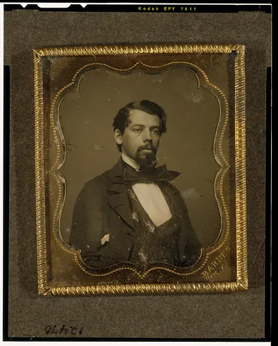 [Unidentified man, head-and-shoulders portrait, facing right]