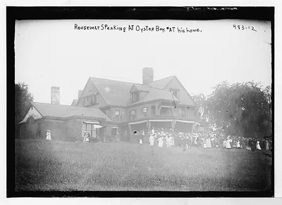 Roosevelt speaking to crowd outside at Oyster Bay, his home, New York