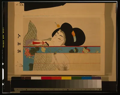 Japanese woodblock print of a woman smoking a pipe