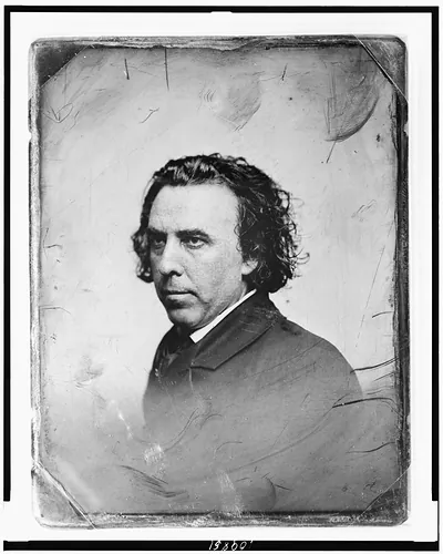 Portrait of an unidentified man with curly hair