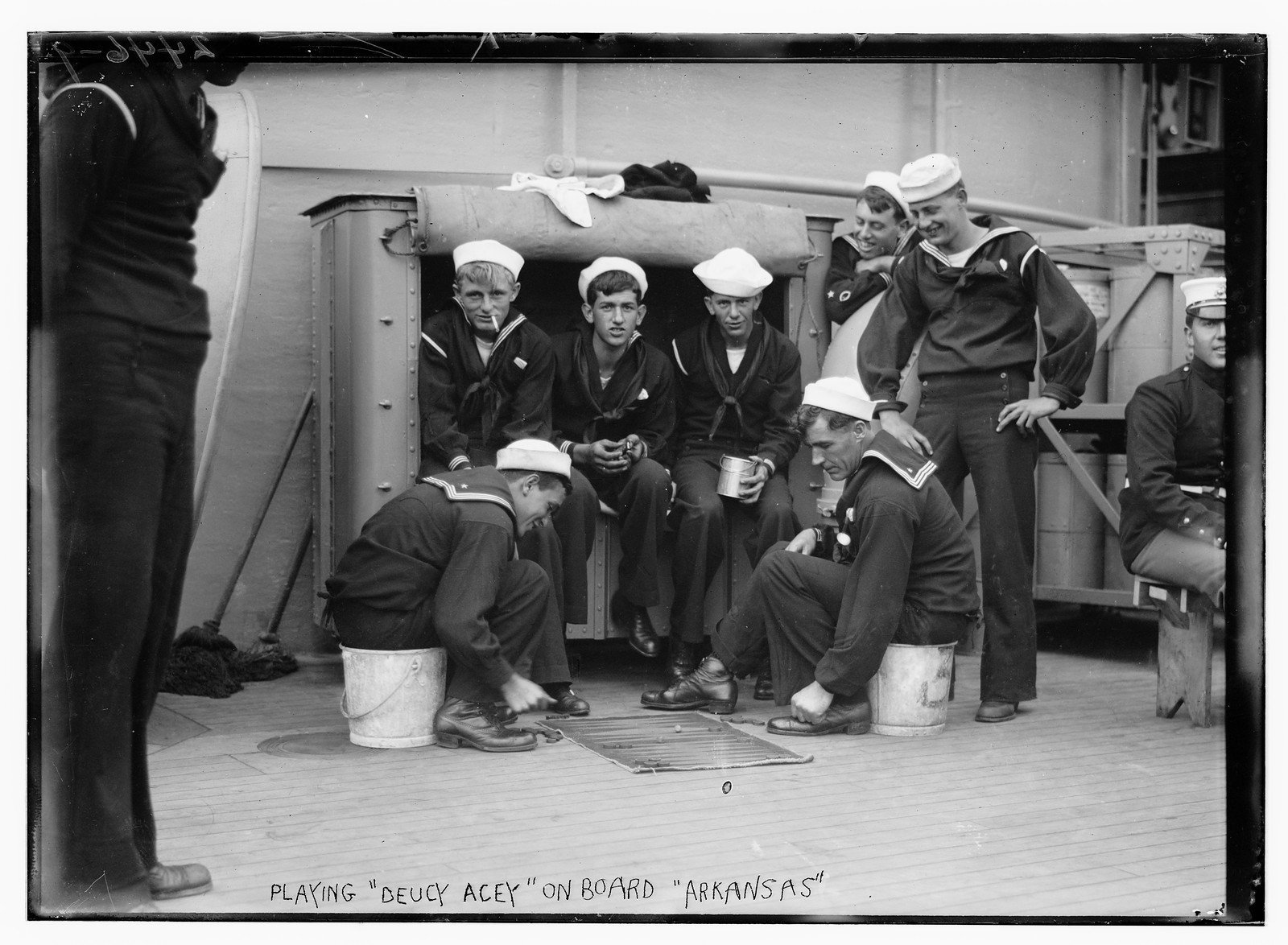Playing "Acey Deucy" on board ARKANSAS, n/a — historic photograph