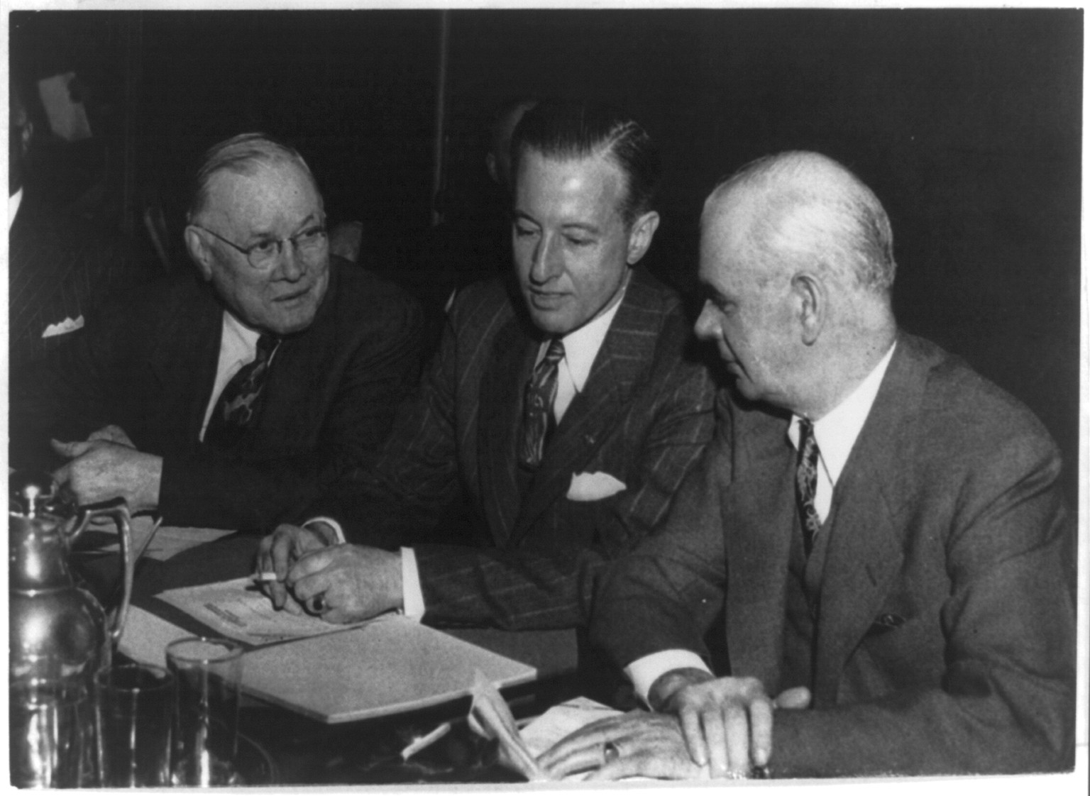 U.S. labor and industrial leaders draw up post war plans ... for a peace charter" for labor and management when the nation's economy will return to a peacetime basis", 1945 April 3. — historic photograph