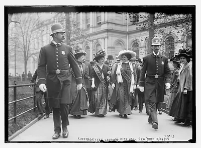 Suffragettes, preceded by policemen, leaving City Hall, New York