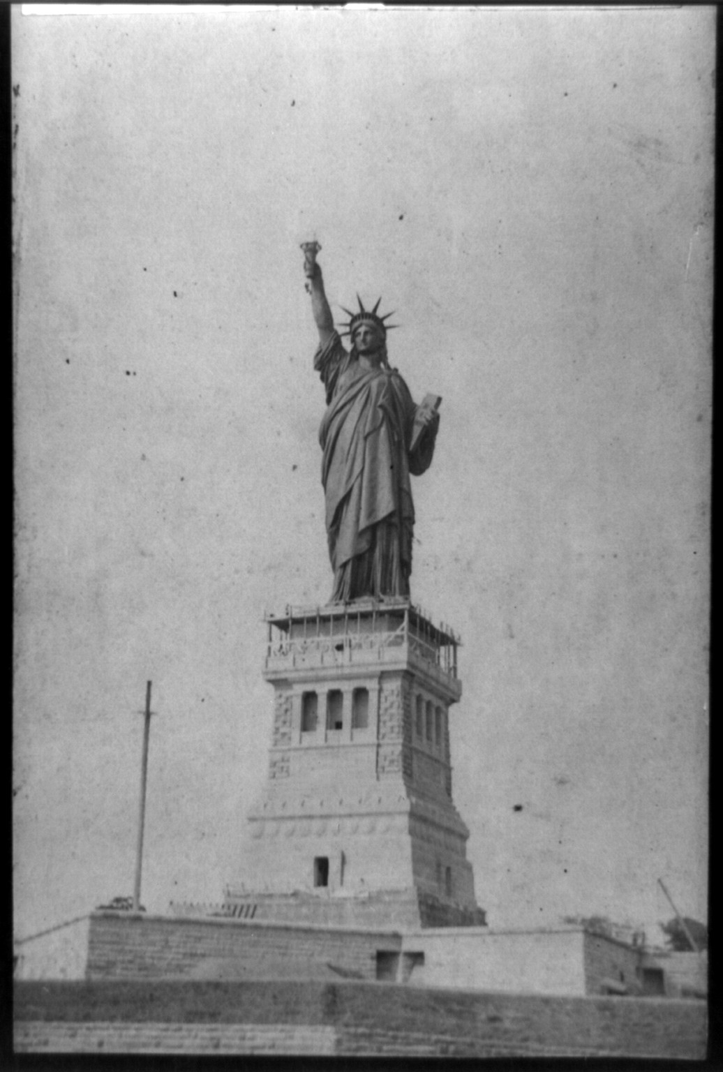 Completing the torch, Statue of Liberty, c1886. — historic photograph