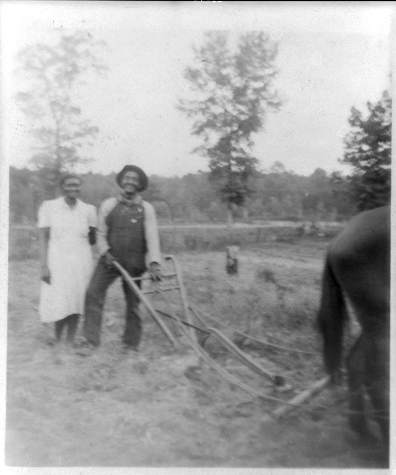 [Henry Truvillion and wife, in the garden, near Newton, Texas] — historic photograph