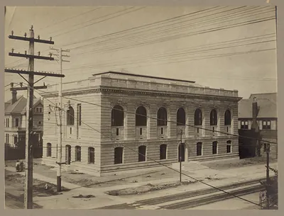 Exterior view of a stone public library building