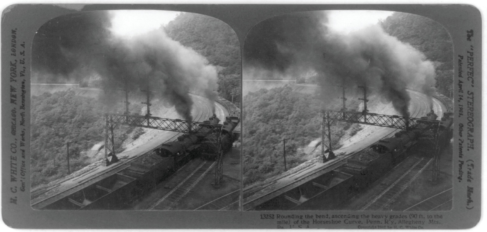 Rounding the bend, ascending the heavy grades (90 ft. to the mile) of the Horseshoe Curve, Penn. R'y, Allegheny Mts., Pa., U.S.A., Chicago : H.C. White Co., c1907. — historic image