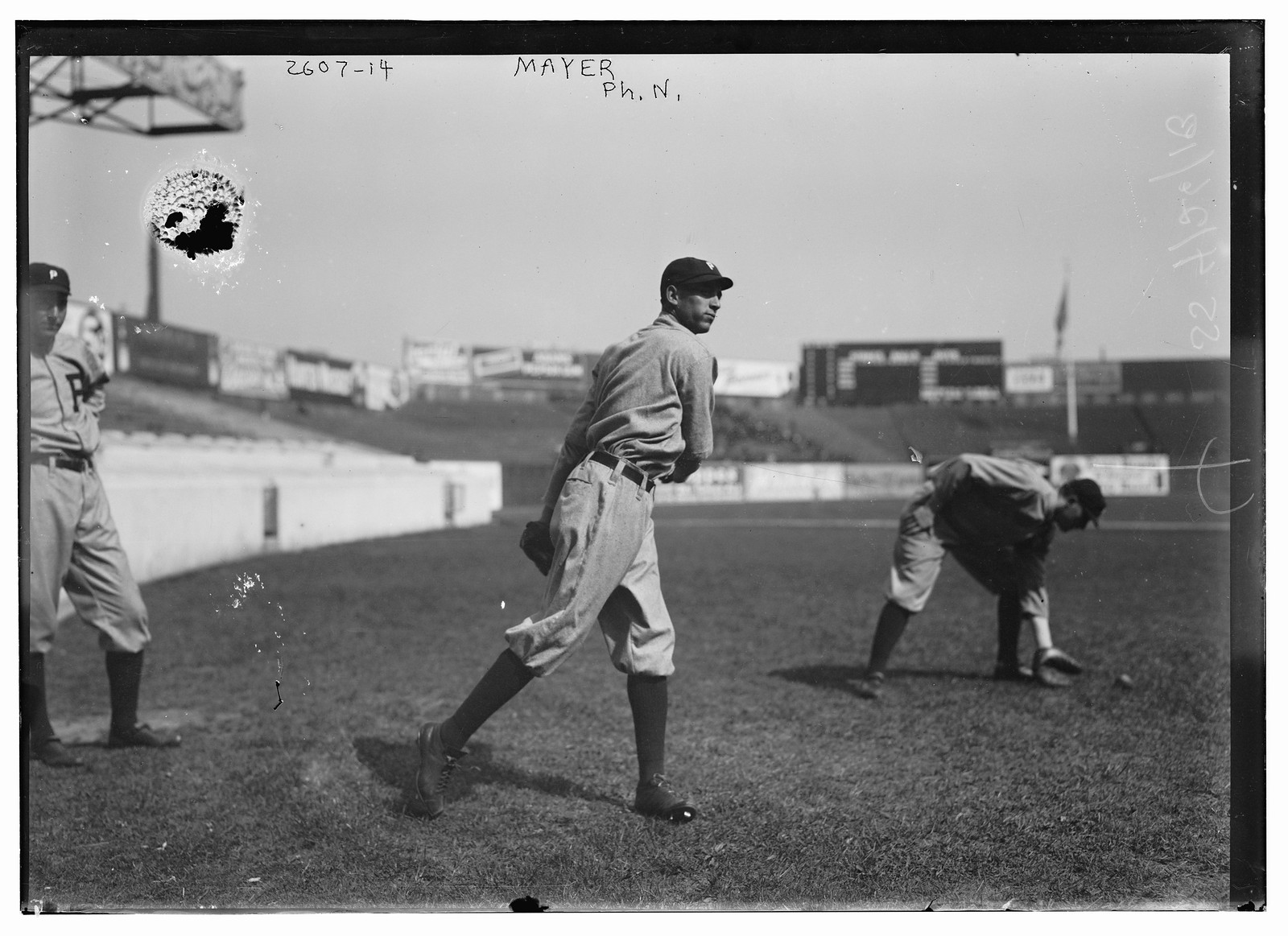 Eppa Rixey, Philadelphia NL, at left, Erskine Mayer, Philadelphia NL, at center, and unknown player at right at the Polo Grounds, New York, [1913] — historic photograph