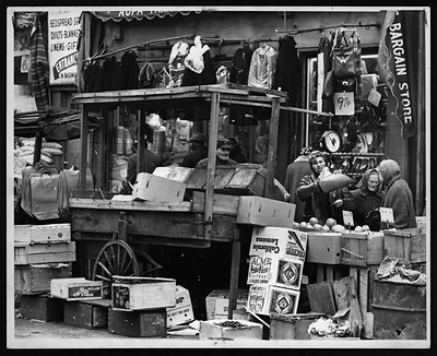 Street market stall with crates, eggs and lemons