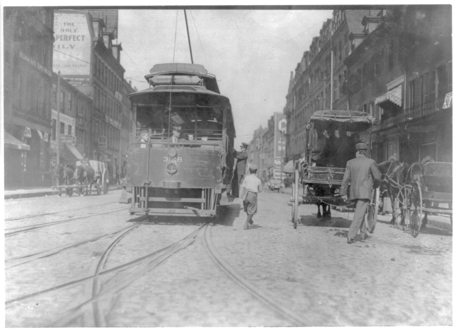 Historic Photo Print - Boston - Newsboy starting to flip a car — historic print