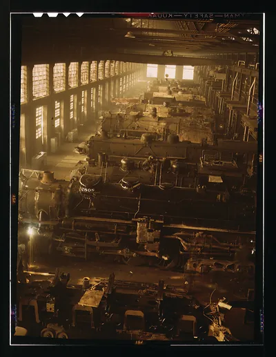 Steam locomotives in a railroad repair shop, number 2808