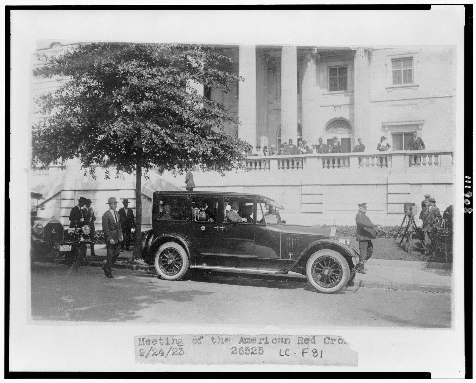 [President Coolidge in automobile at D.A.R. Hall, where he attended a meeting of the American Red Cross], [1923] — historic photograph