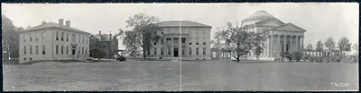 Panoramic photograph of university campus buildings with a domed rotunda
