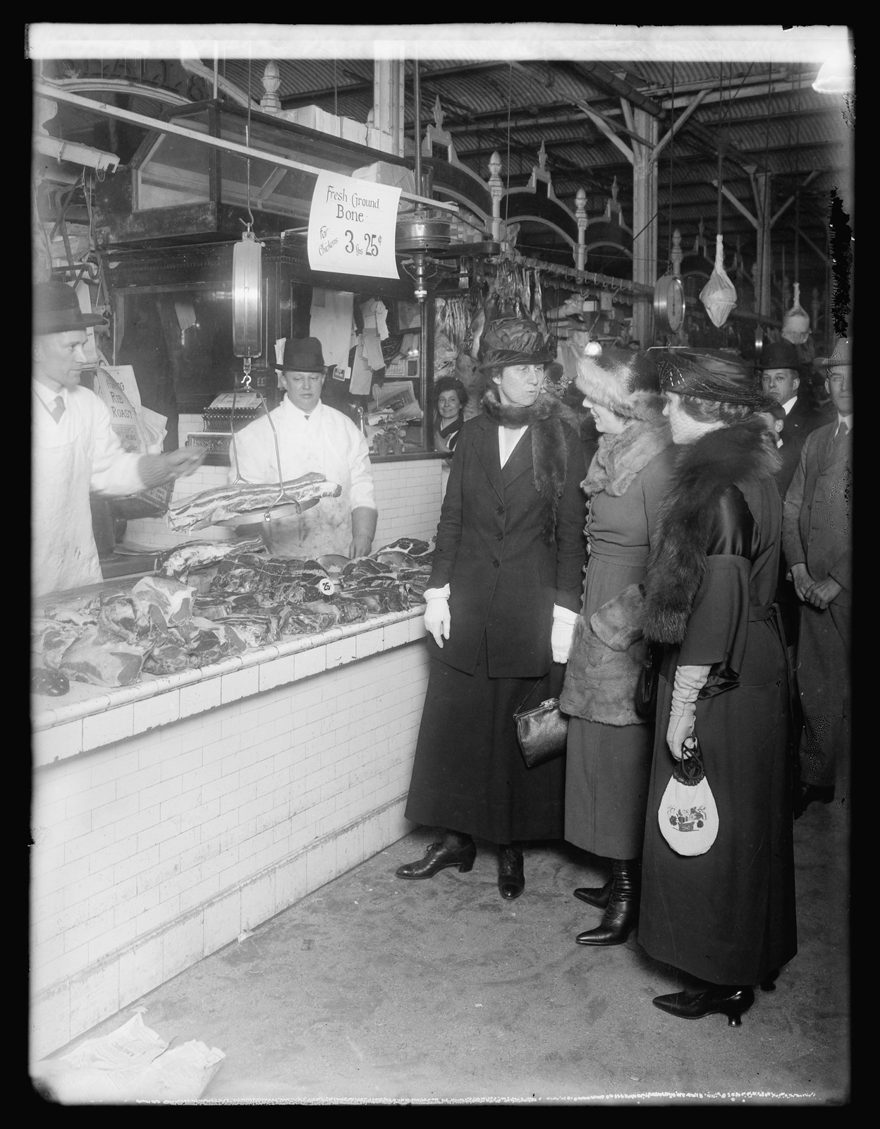 Mrs. Houston, Mrs. Robbins, & Mrs. Grayson in mkt., [1919 or 1920] — historic photograph