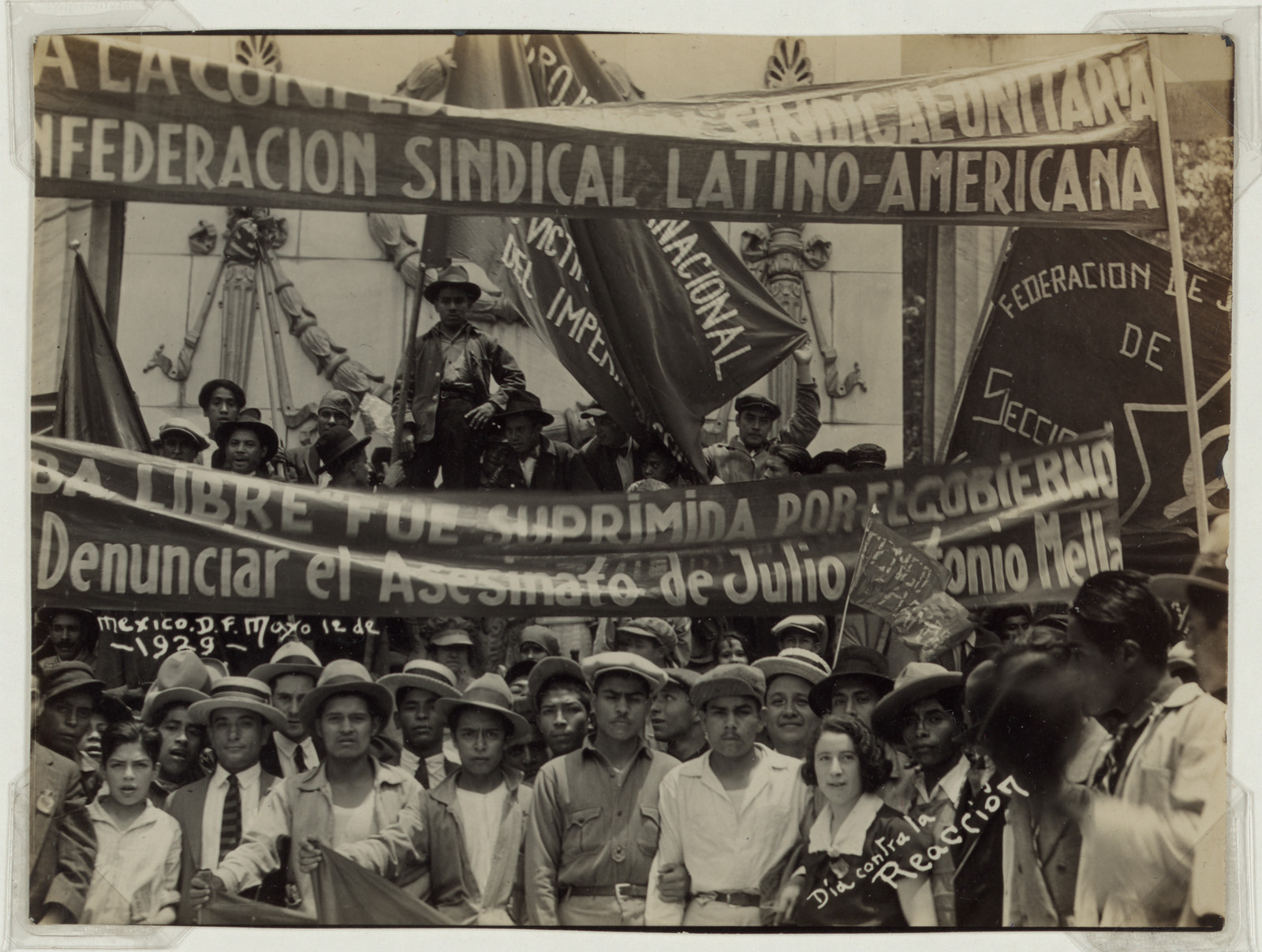 Demonstration with banners: Federación Sindical Latino-Americana, Día contra la Reacción — historic image