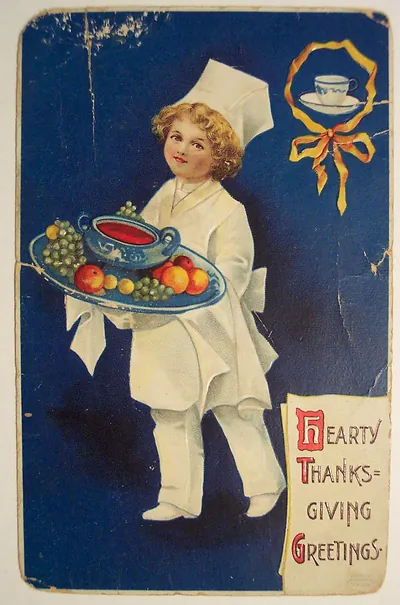 Hearty Thanksgiving Greetings postcard with child chef carrying tray
