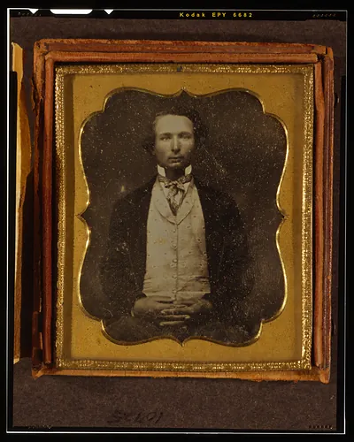 Unidentified man, half-length daguerreotype portrait in gold case