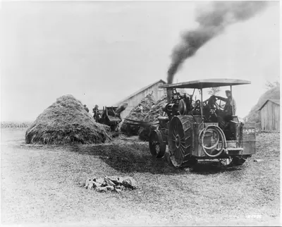Case thresher and 75 horsepower steam engine [threshing grain]