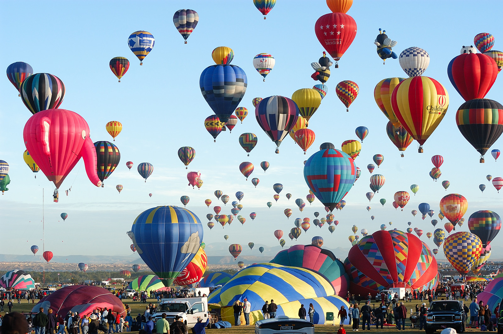 Hot air balloons rising in a mass ascension — historic image