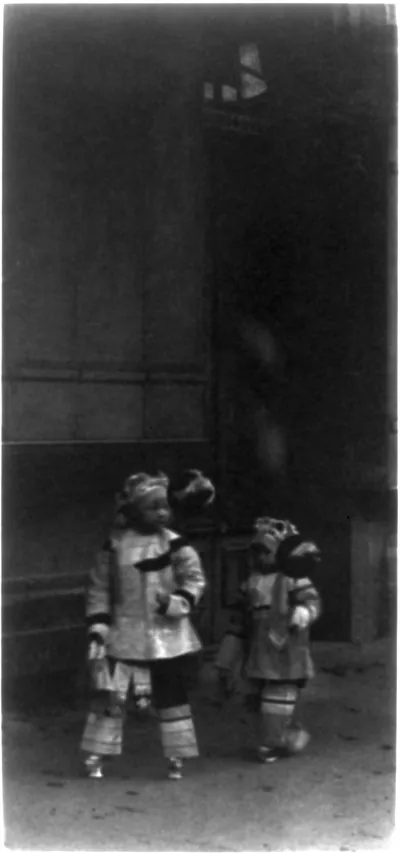 Two girls with balloons [Chinatown]