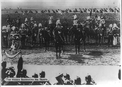 [Kaiser Wilhelm II on horseback reviewing his troops]