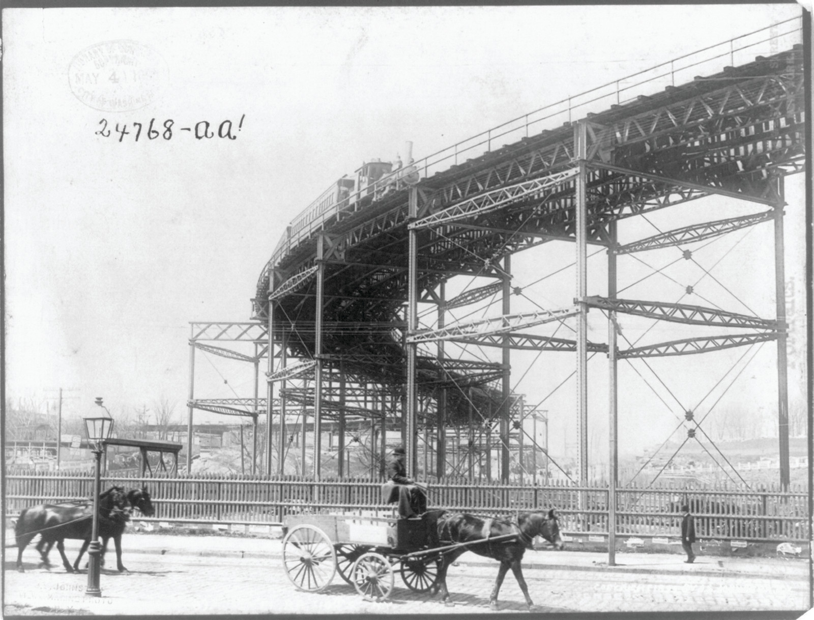 [New York City - elevated train on curve above horse-drawn wagon] — historic photograph