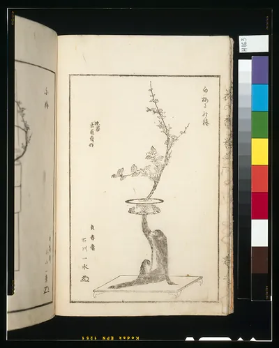 Woodblock page showing a flowering branch arrangement in a stand