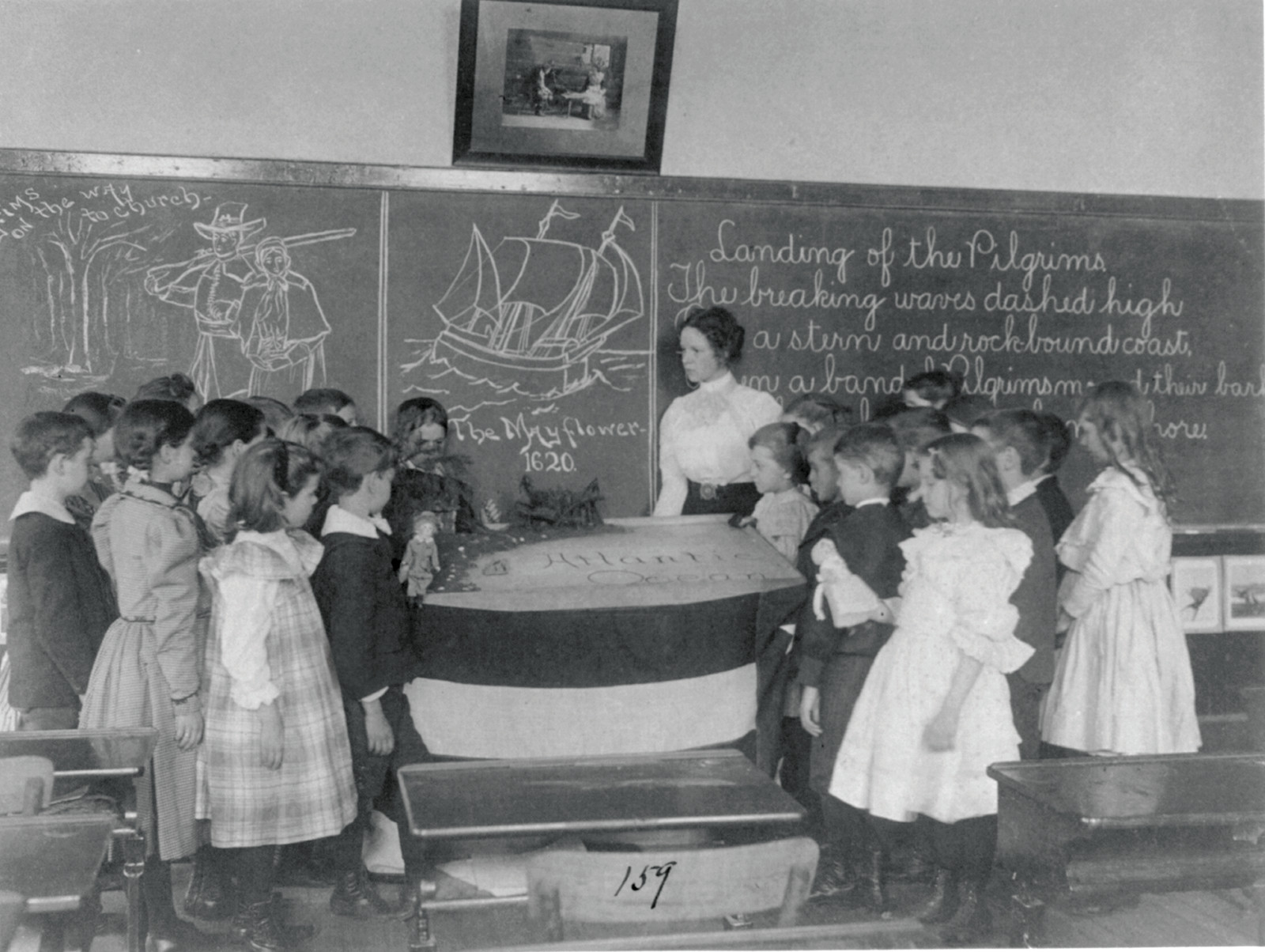 [Wash., D.C. public school classroom scene, ca. 1899: students studying the landing of the Pilgrims at Plymouth, Mass. (1st Div. no. 159)], [no date recorded on caption card] — historic photograph