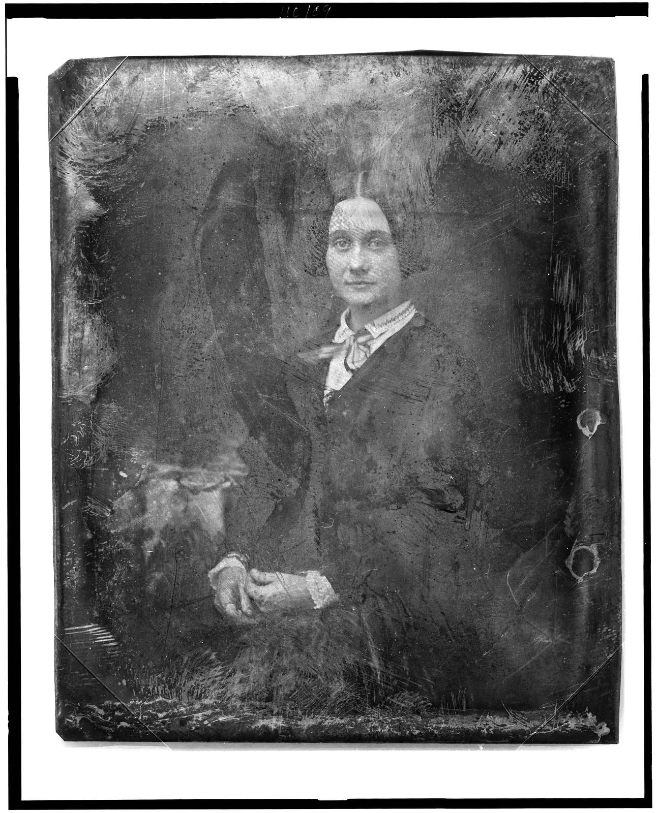 Unidentified woman, seated three-quarter length daguerreotype portrait, 1844 — historic photograph